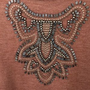 Beaded Sweatshirt new W/O tags w/chiffon hem. Covers your bottom.